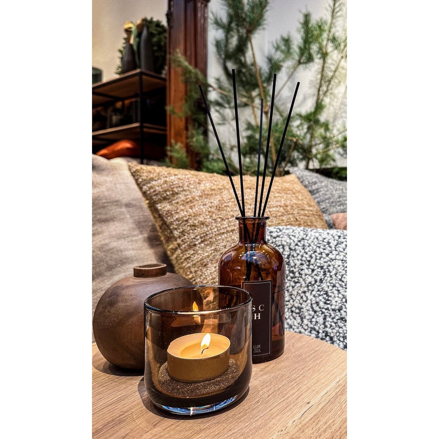 Scapa_Home_brown blown glass vase_lantern_Titus_diffuser_Lux_table setting