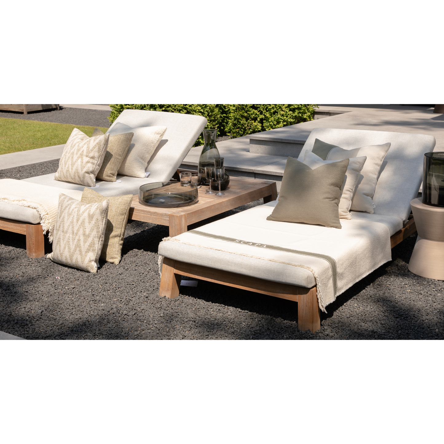 Scapa_Home_grey glass accessoiries_on_sunbeds_garden_setting