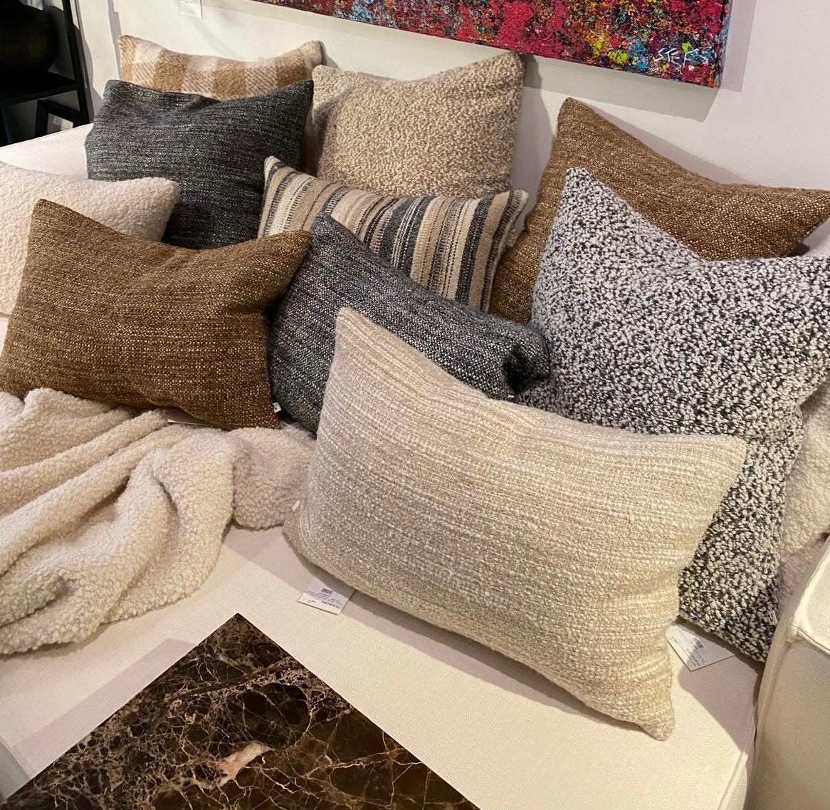 Scapa Home sofa setting with grey broiwn and beige cushions