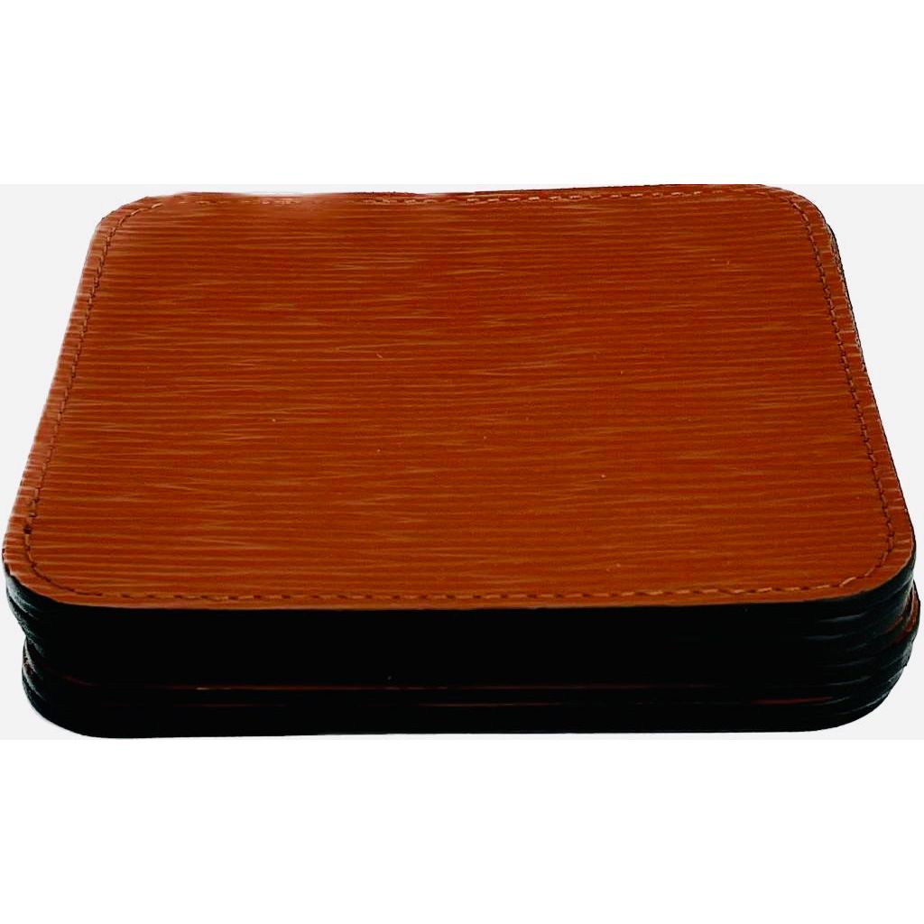 Pinetti_leather_coasters_orange_stacked Pinetti_leather_coasters_orange_stacked