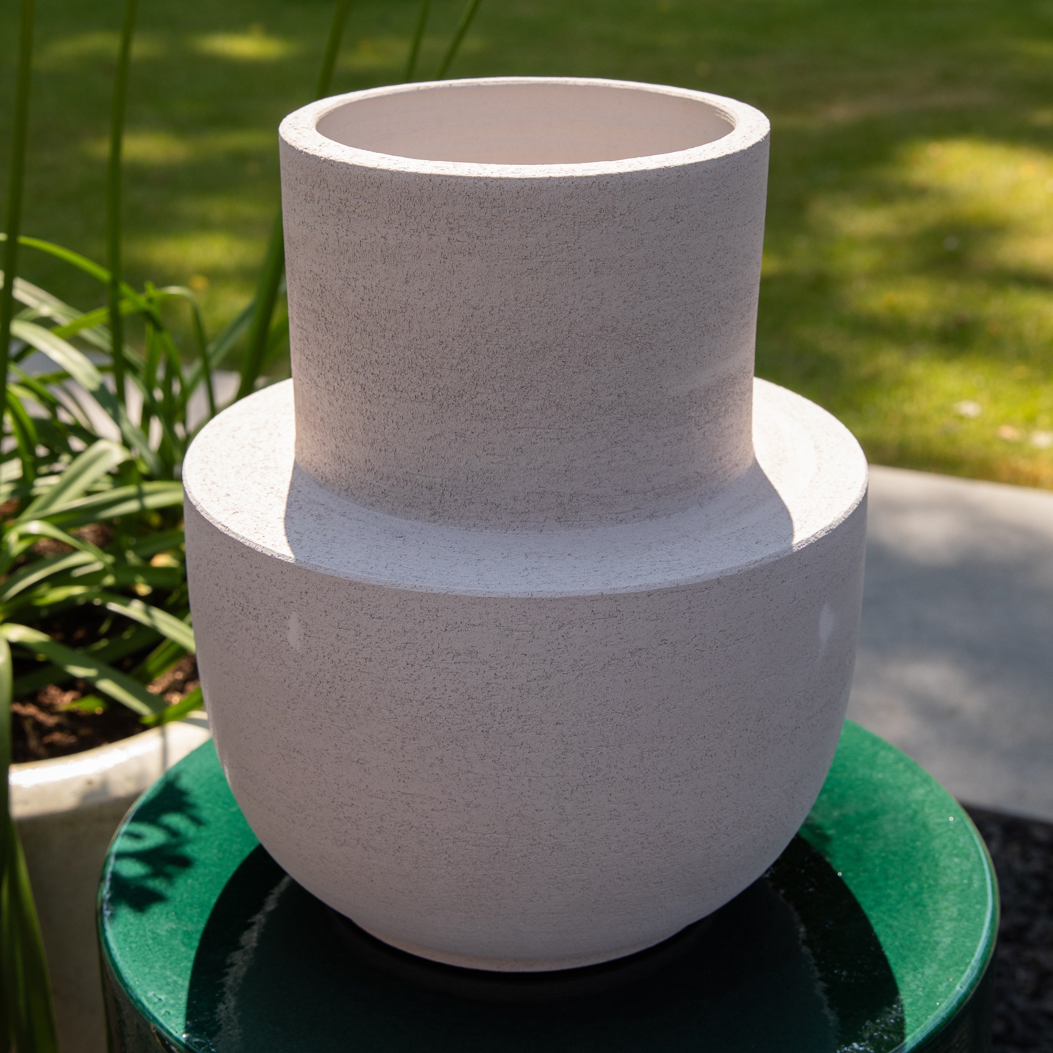 Serax_stool and vase by_Piet_Boon_garden_setting