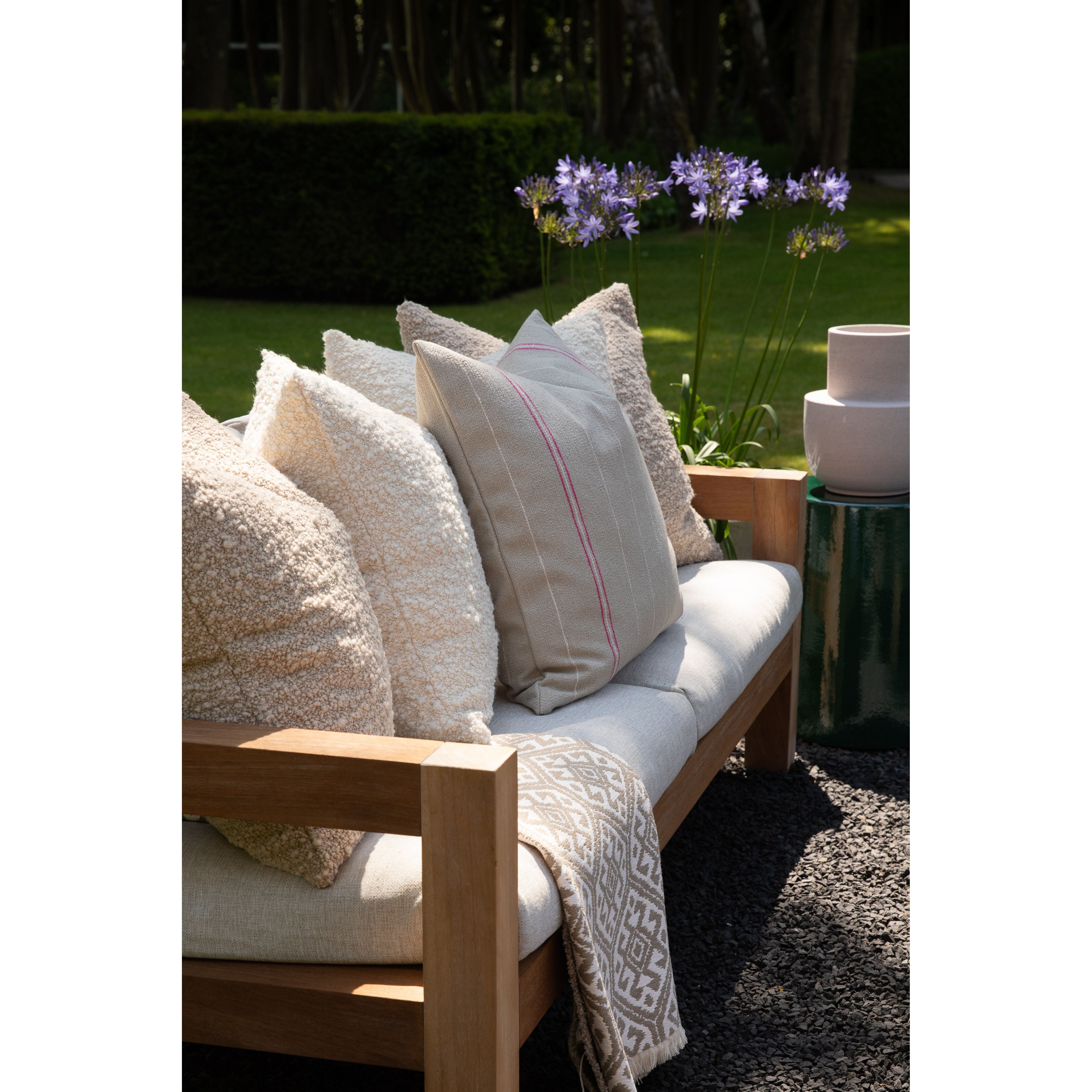 Serax_stool green and Scapa_Home_cushions and throw garden_setting
