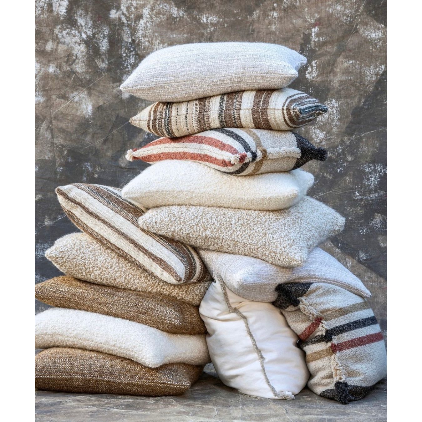 Scapa_Home_cushion stack in neutral colours Scapa_Home_cushion stack in neutral colours